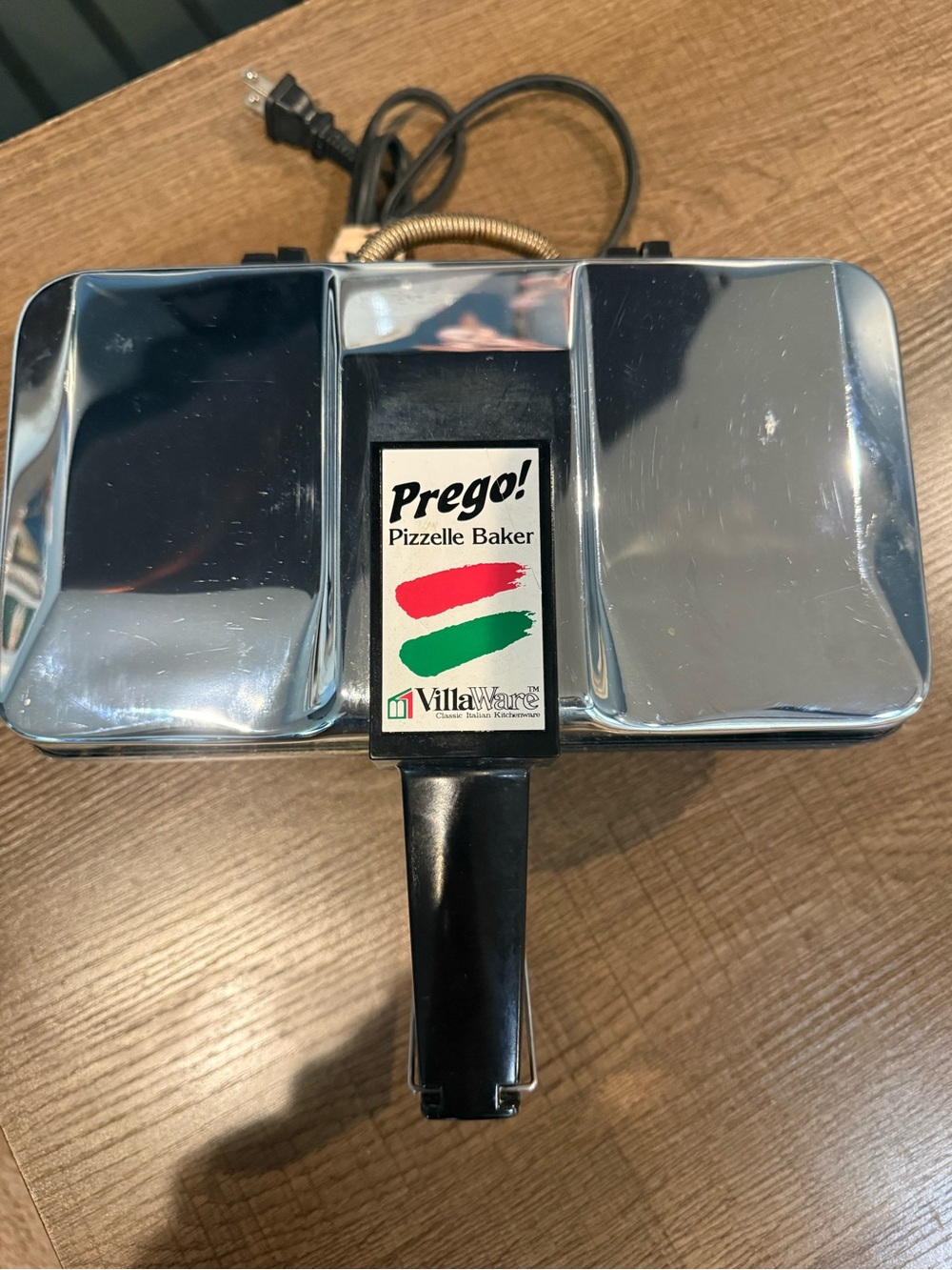 Prego! Pizzelle Baker by - Polished Silver Finish